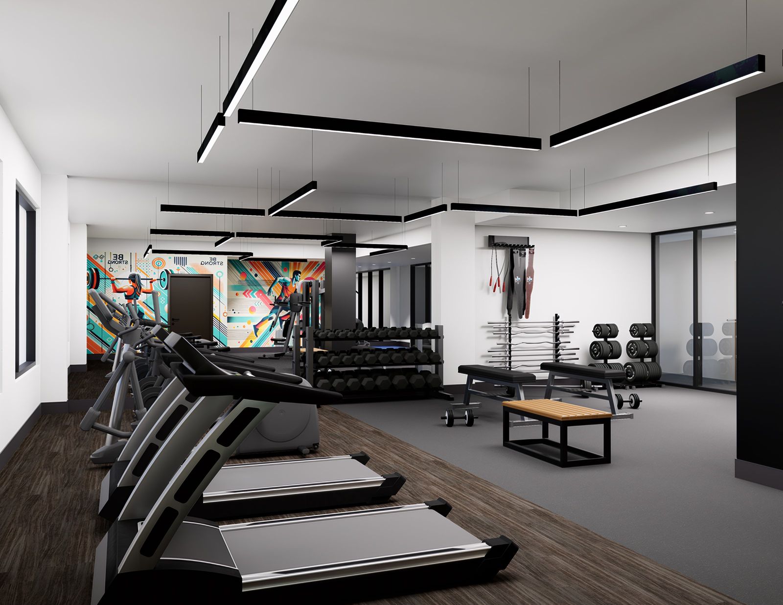 Gimnasio con caminadoras, mural de color y luminarias lineales negras