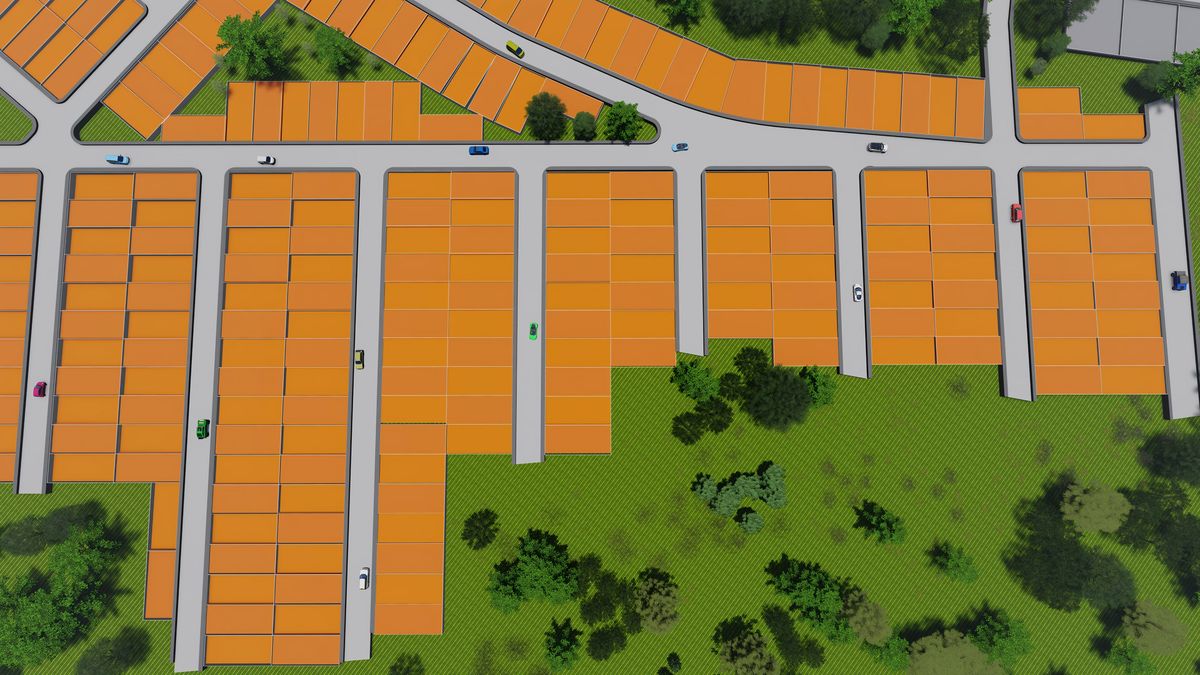 Vista aérea de un plan maestro de lotes naranjas, calles y áreas verdes