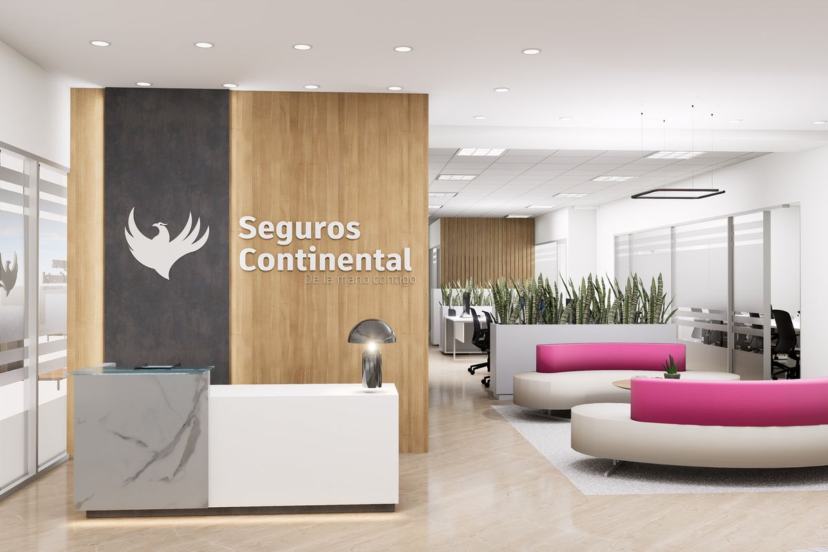 Seguros Continental reception with a timber panel, logo and fuchsia sofas
